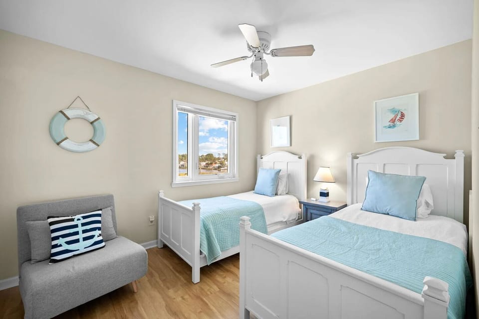 Bedroom 2 features two twin beds.