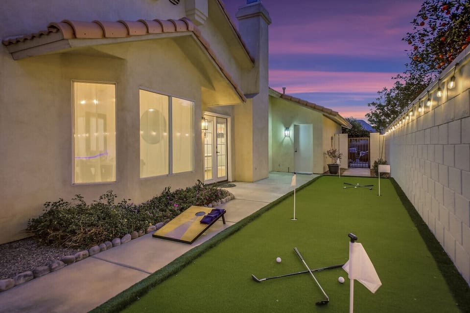 Private backyard green space ideal for games & evening lounging