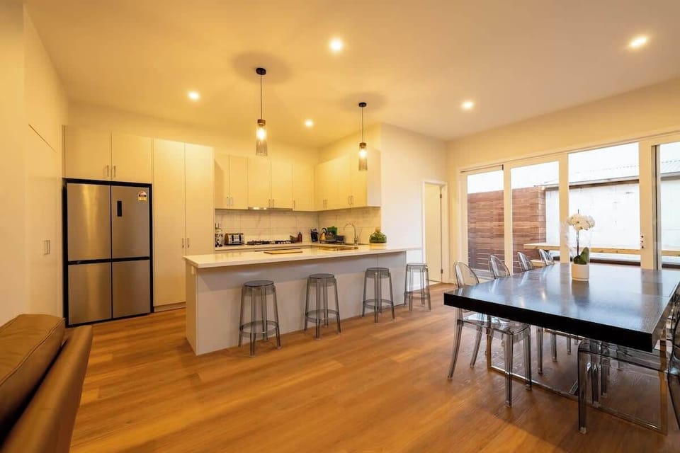 Open plan living, dining and kitchen space with enough room for up to 8 guests.