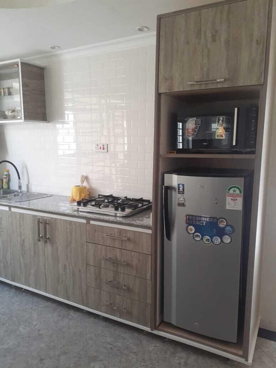 Family Bungalow | Private kitchen | Fridge, microwave, cookware/dishes/utensils