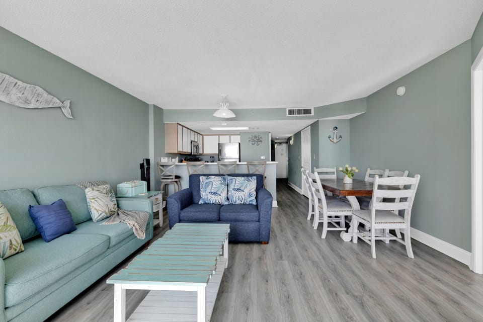 Signature Condo, 3 Bedrooms, Balcony, Ocean View | Living room | 65-inch Smart TV with cable channels