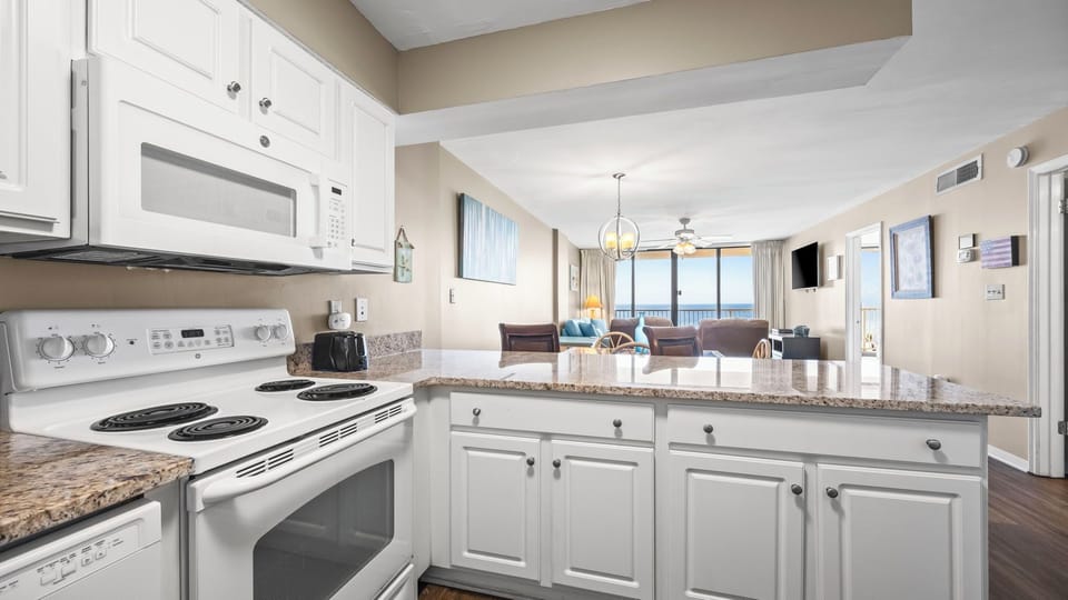 Seaside Beach & Racquet Club 5517 - Fully equipped kitchen with a Keurig, toaster, and air fryer — ideal for preparing meals with ease.