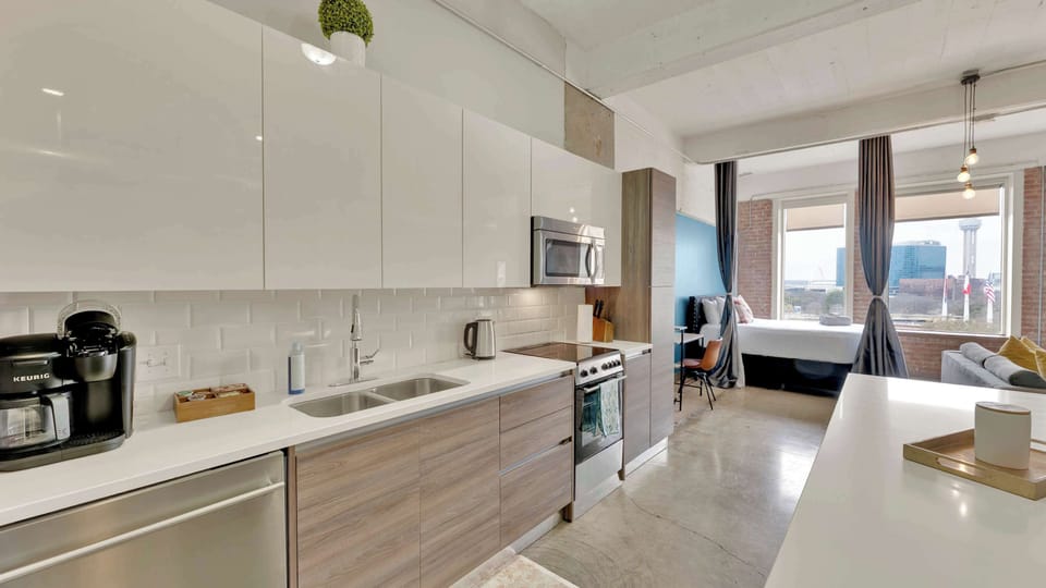 Kitchen Haven: Enjoy modern appliances and stunning city views while cooking up a feast!