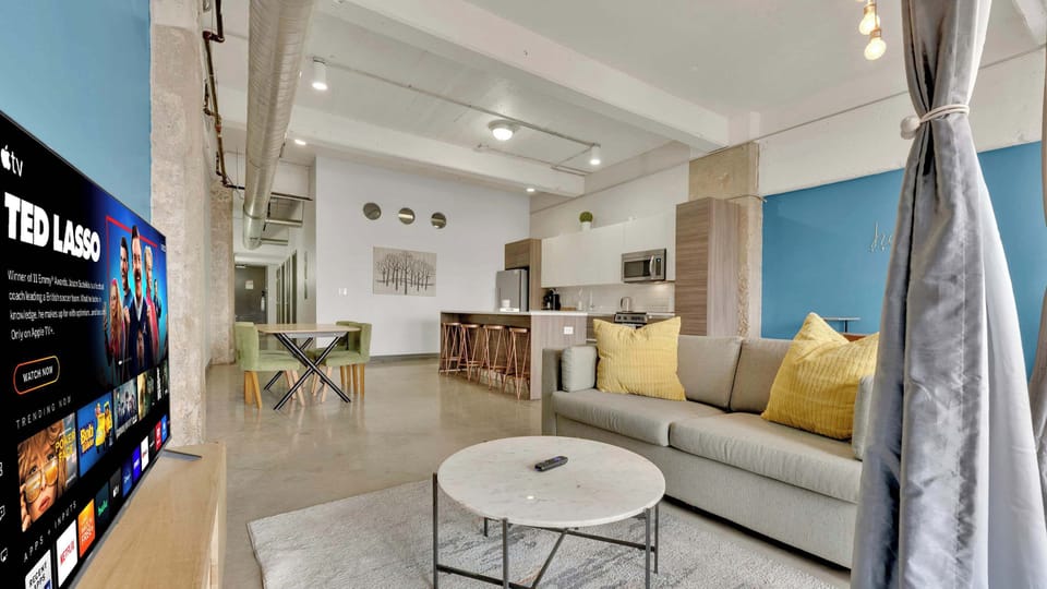 Living Room: Bright space with stylish decor, perfect for relaxation or movie nights!