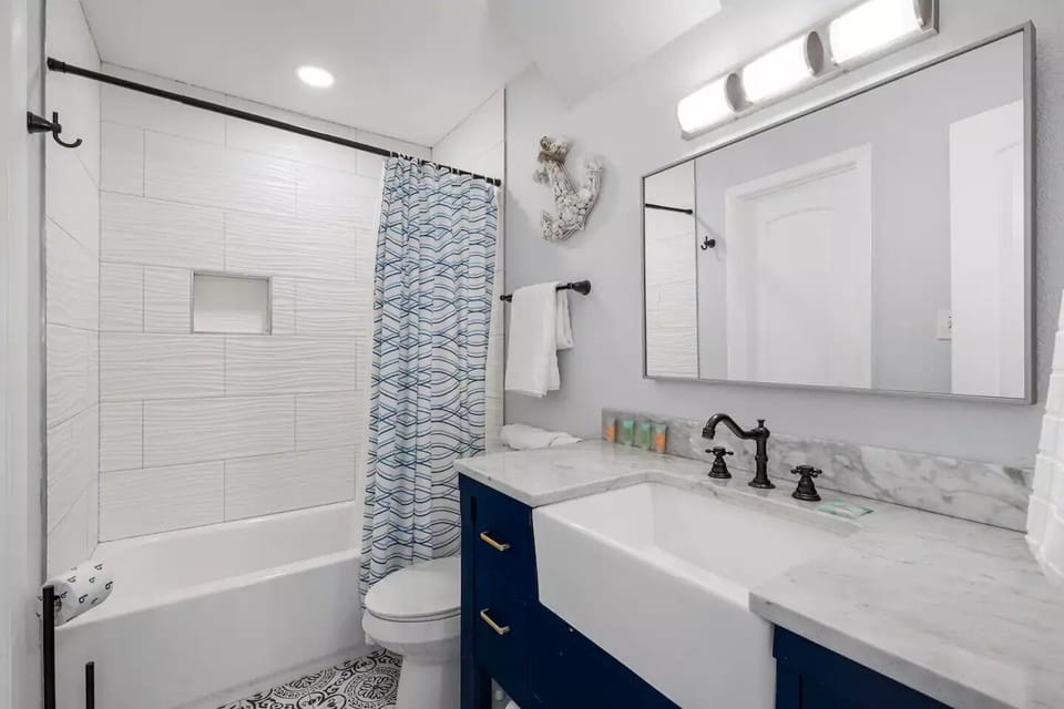 Spacious bathroom on 2nd floor. Bath tub and shower are available.