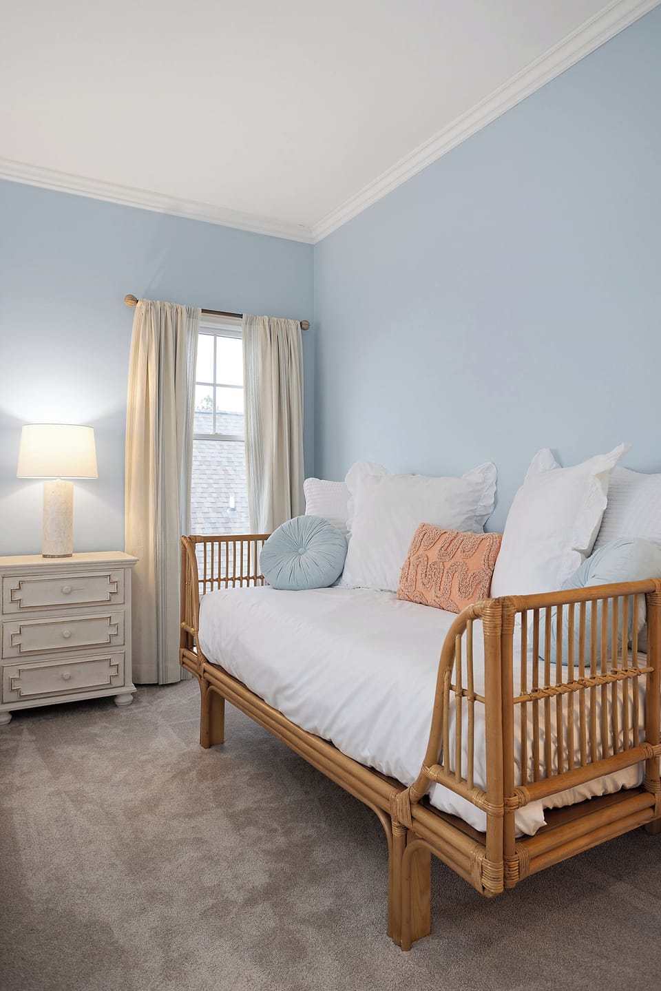 There is a twin daybed in the primary bedroom for relaxing and sleeping.