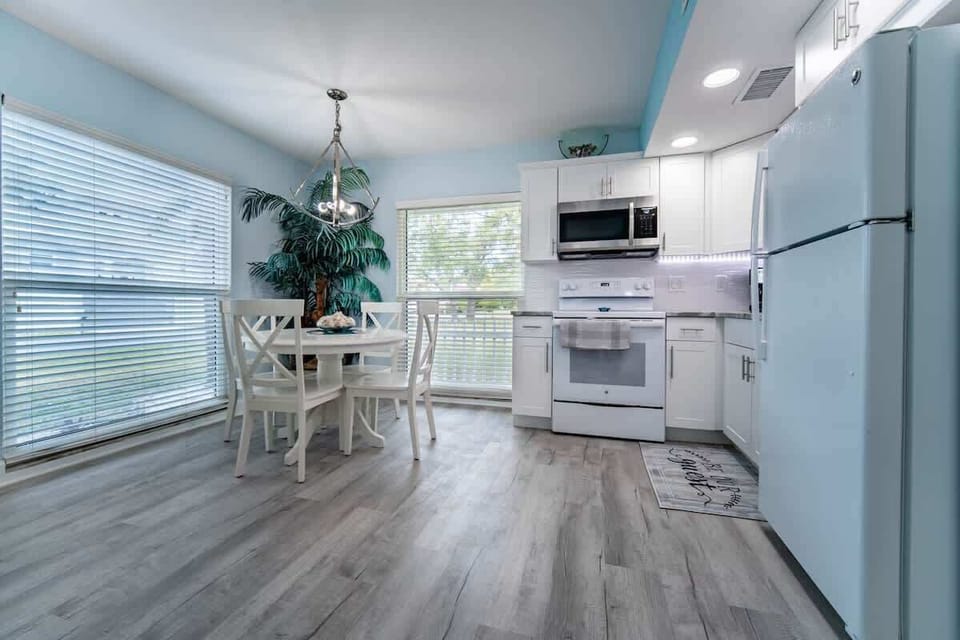 Beautiful granite kitchen and dining area with table for 4. 