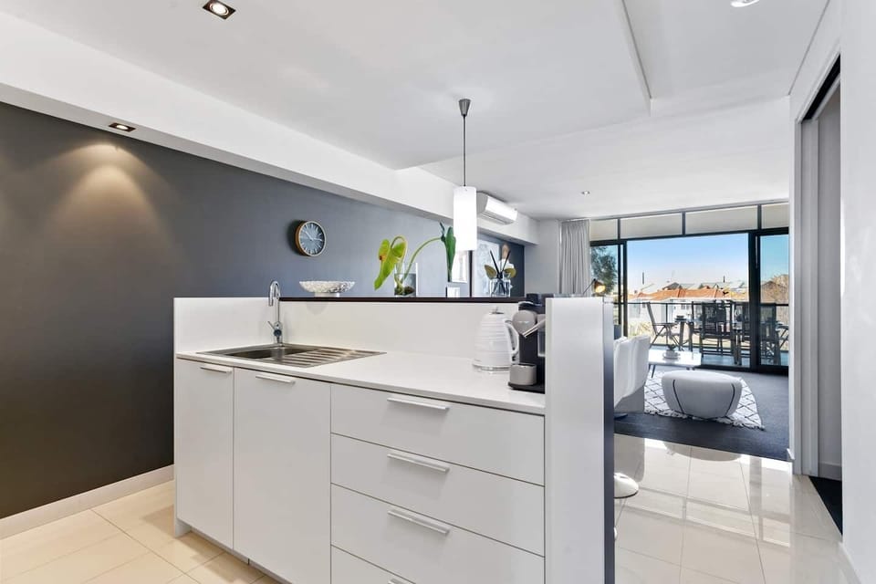 Modern kitchen with island bench.
