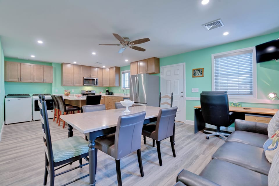 Open concept kitchen and dining areas 
