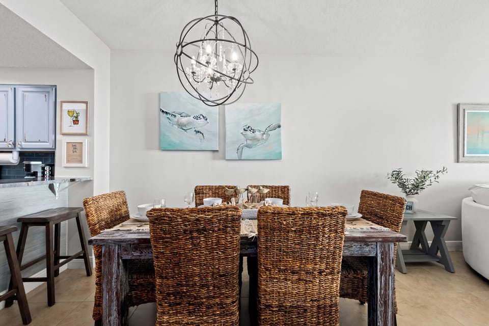 [Dining Room} Behind you is a hutch loaded with dishes & margarita glasses!