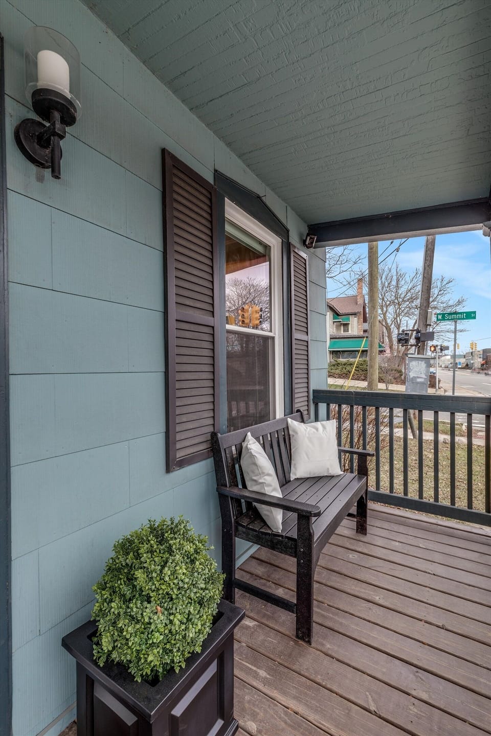 Our Front Porch has a bench and two rocking chairs