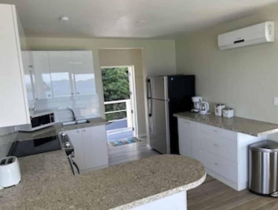 Kitchen look towards front door.