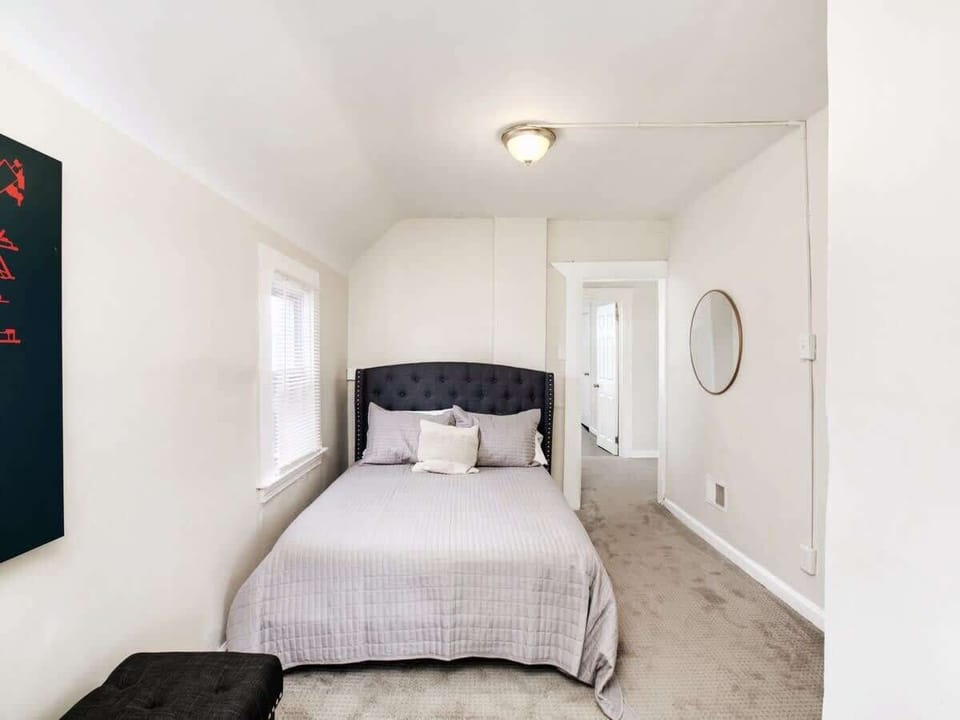 Bedroom 5: Private alcove bedroom with plush bed.