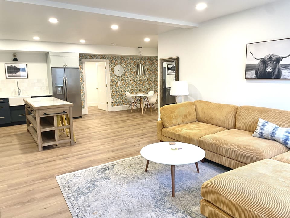 Huge, open living, dining, kitchen space for gathering.