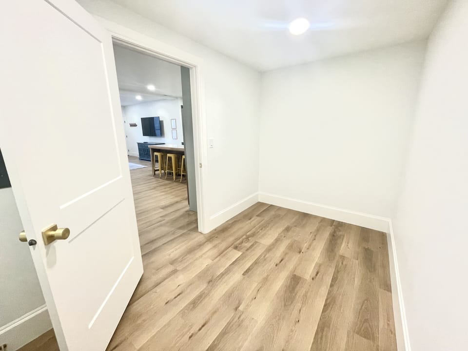 Bonus storage room with washer/dryer.  Fits air mattresses or travel crib.
