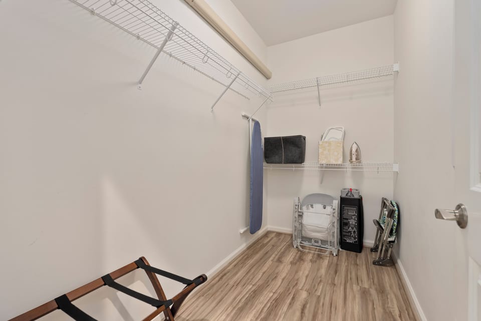Primary bedroom's walk-in closet.