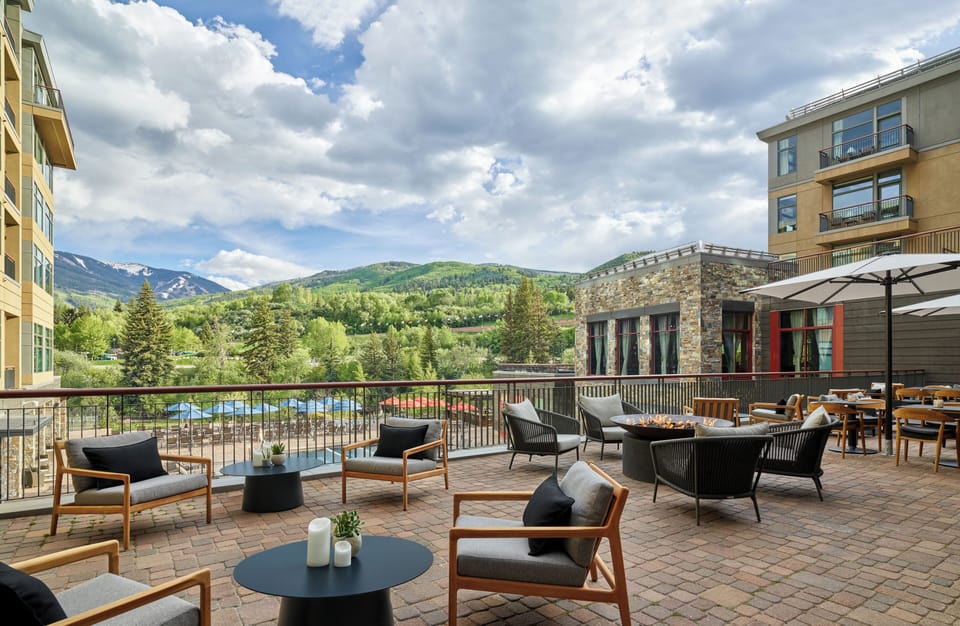 Outdoor dining areas with mountain views.