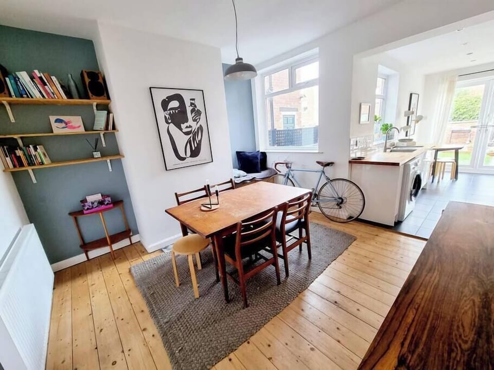 Gather round the spacious open-plan dining room for meals together with the whole group