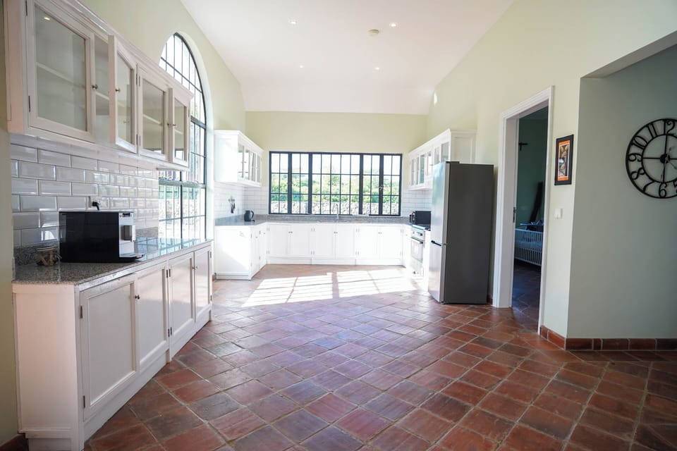 Luxury Villa | Private kitchen | Stovetop, electric kettle, freezer