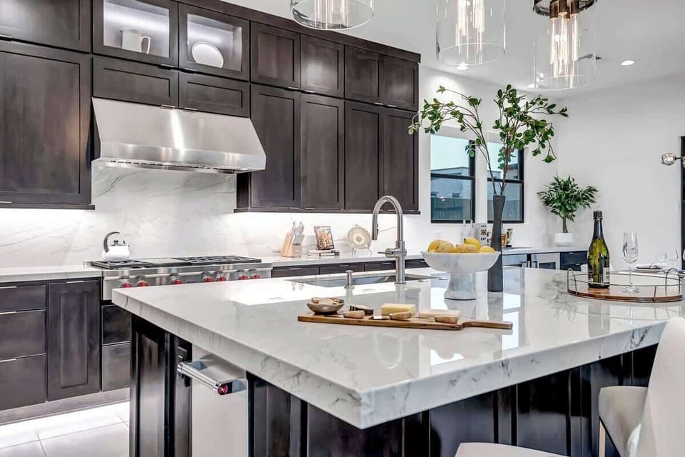 In this stylish kitchen, where modern design meets everyday practicality, every meal becomes an opportunity to create something special. The inviting space, with its sleek surfaces and cozy ambiance, is perfect for culinary adventures and memorable gatherings.
