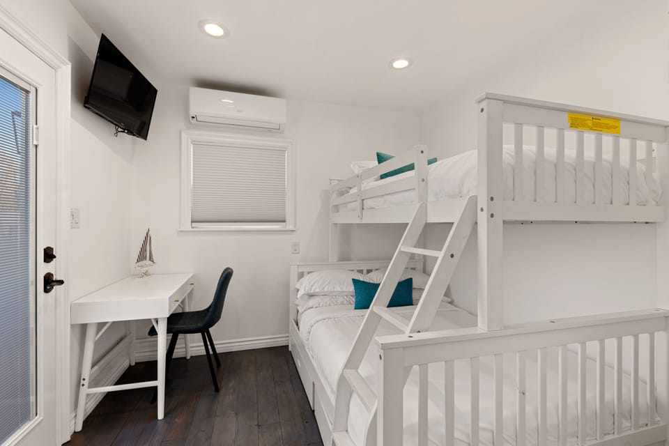 The fourth room offers a Twin over Full bunk bed for added sleeping arrangements