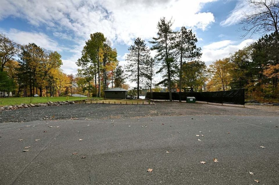 There is a large parking area for vehicles and trailers.