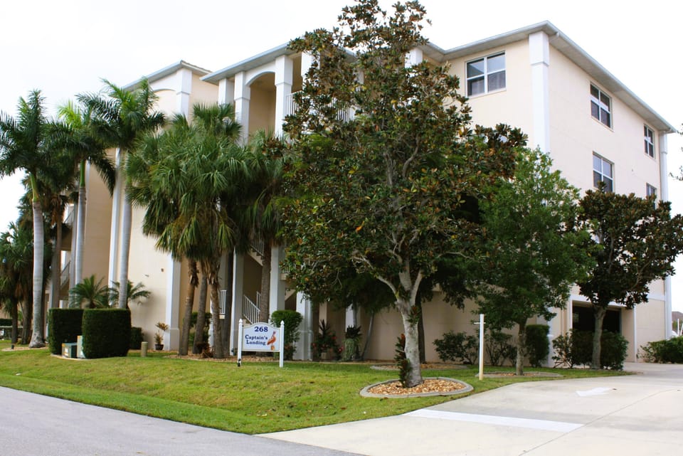 Exterior photo of building and underground parking enterance.
