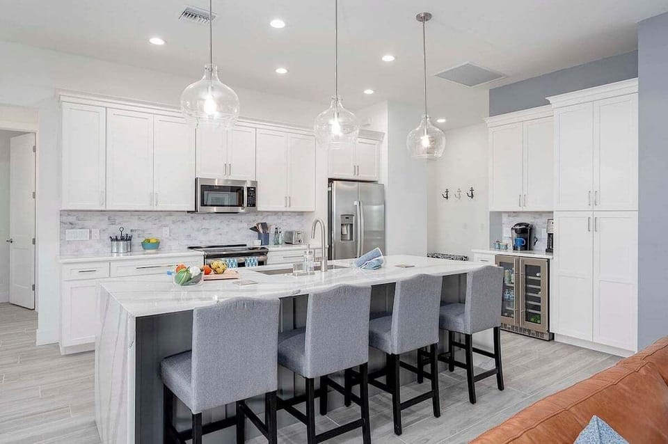 Large Kitchen Island with Waterfall and Additional Seating