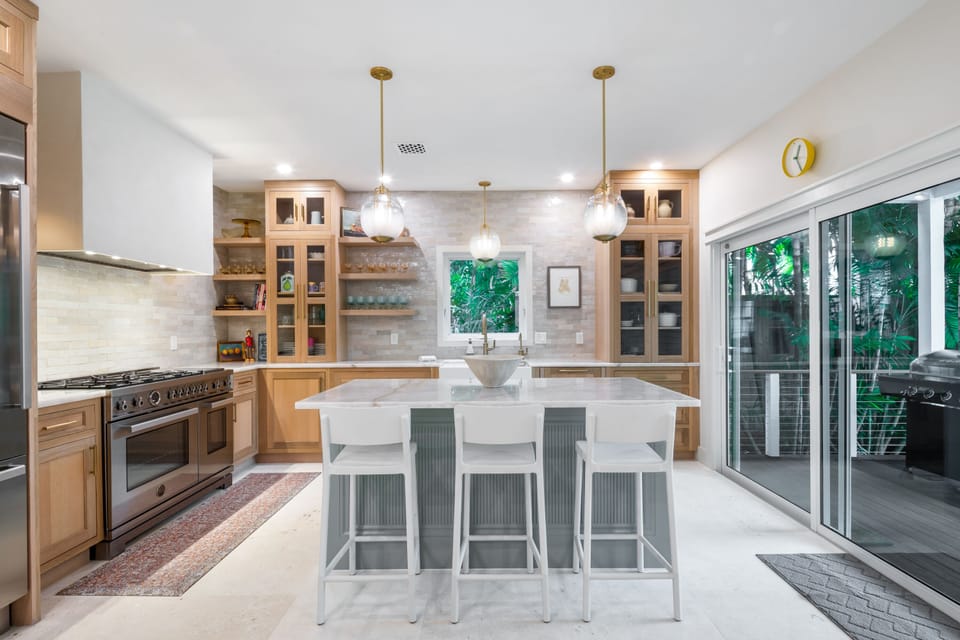 Chef's kitchen with seating at the island.
