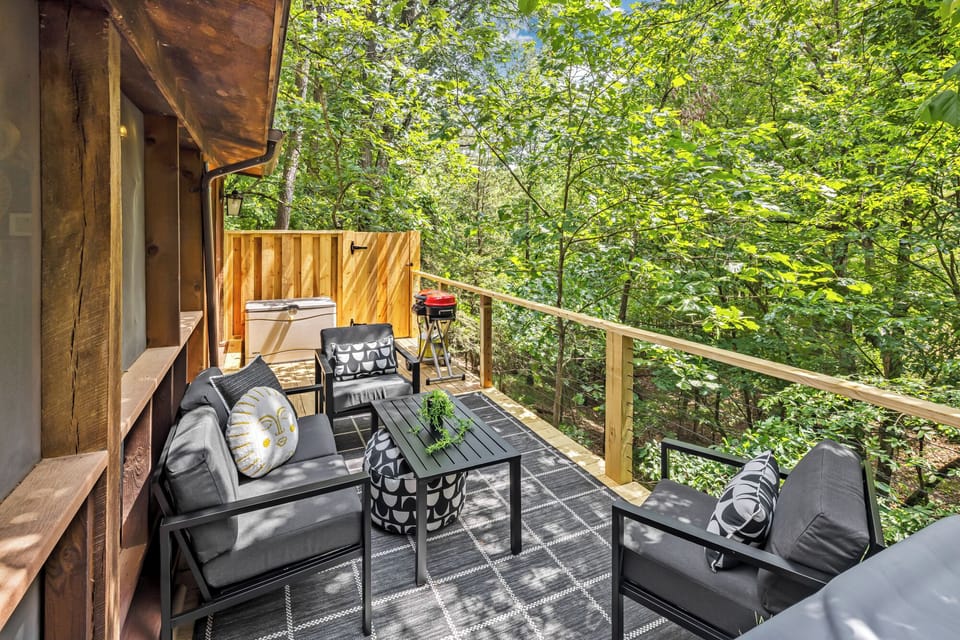 Fire up the gas grill for an easy dinner among the trees on your spacious elevated deck. The comfortable outdoor lounge seating makes this the best spot for slow mornings with a coffee or sunset wine.