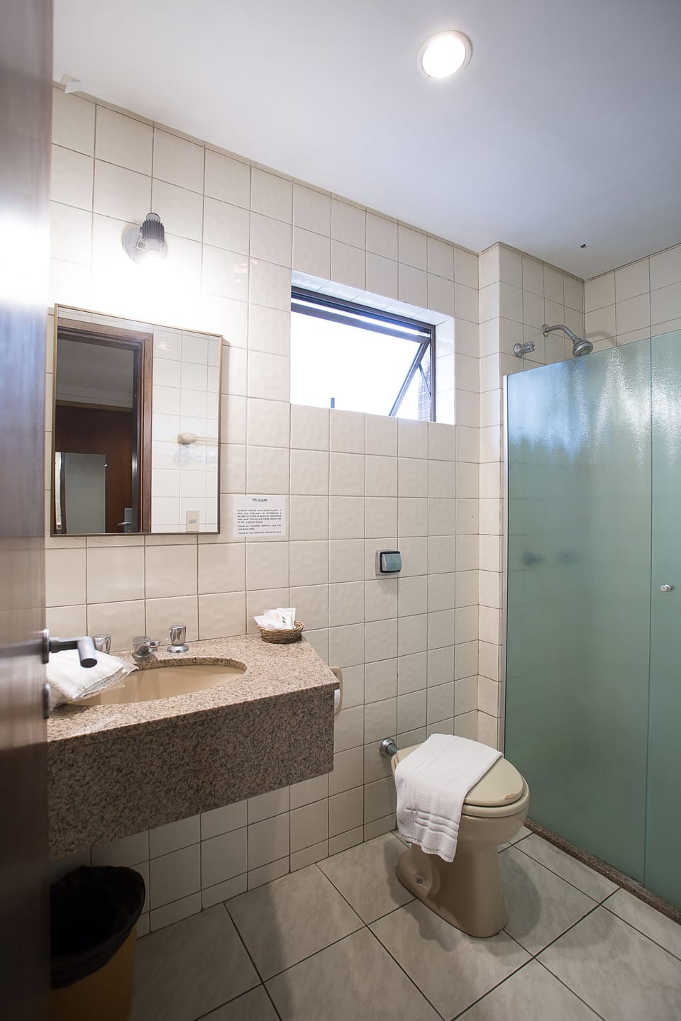 Shower, towels, soap, toilet paper