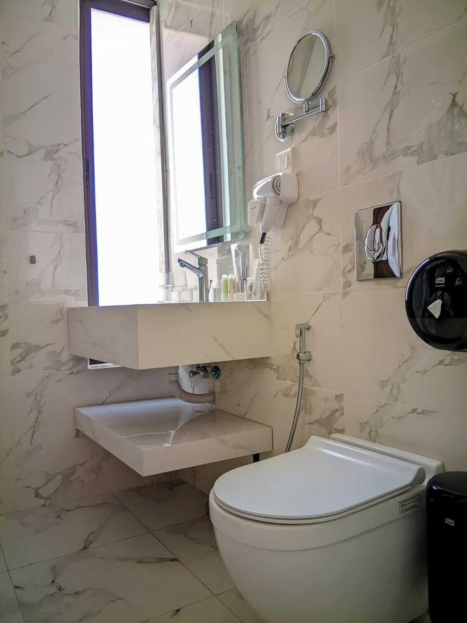 Eco-friendly toiletries, hair dryer, bathrobes, slippers