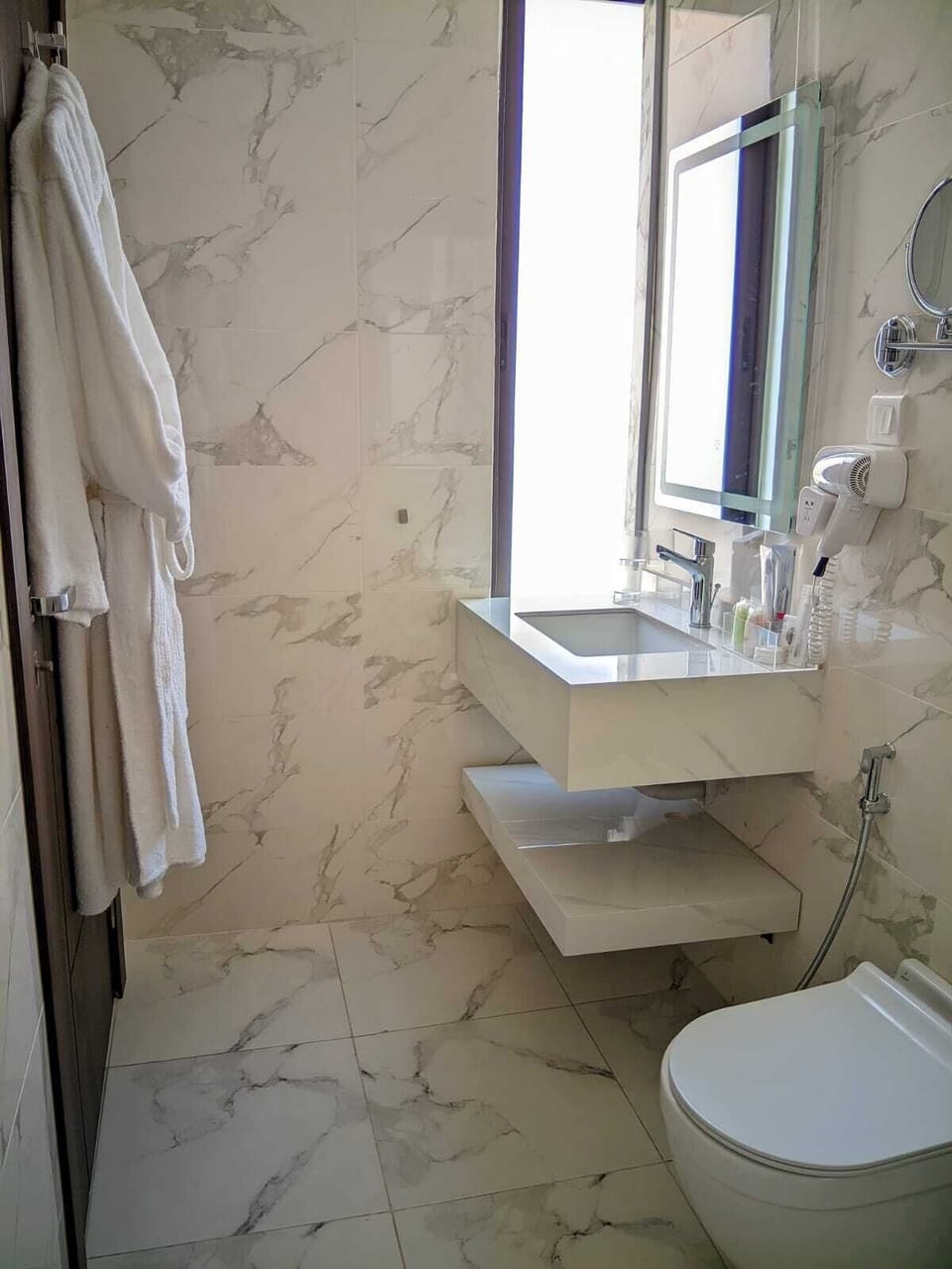 Eco-friendly toiletries, hair dryer, bathrobes, slippers