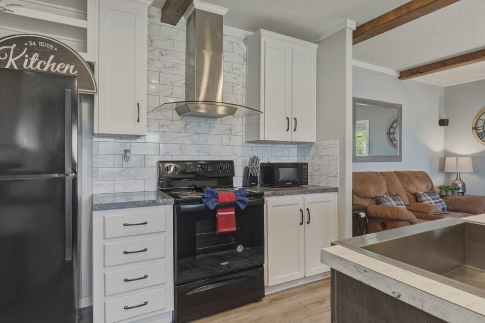 Kitchen with appliances and open layout