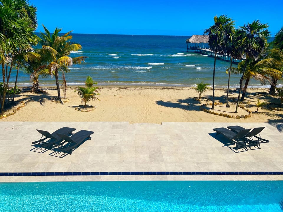 Enjoy the beach and Caribbean Ocean from our Pool Deck or covered patio