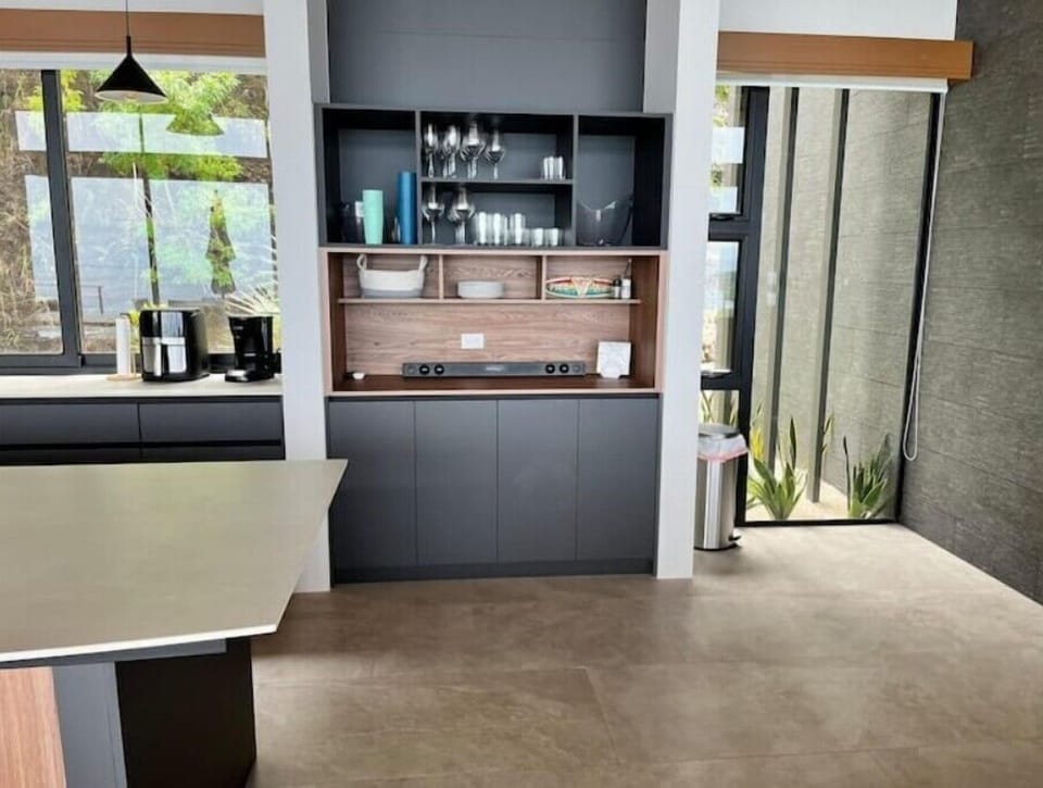 Glassware and additional storage in the kitchen
