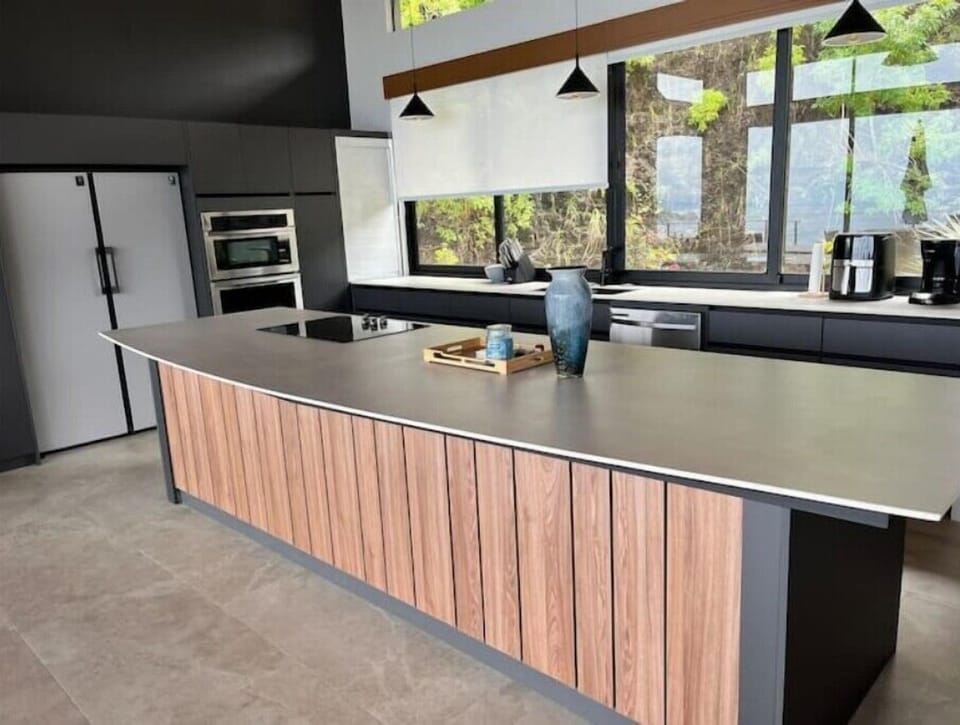 Large kitchen with center island that seats 10 people