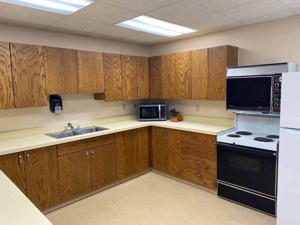Large, fully-stocked kitchen.