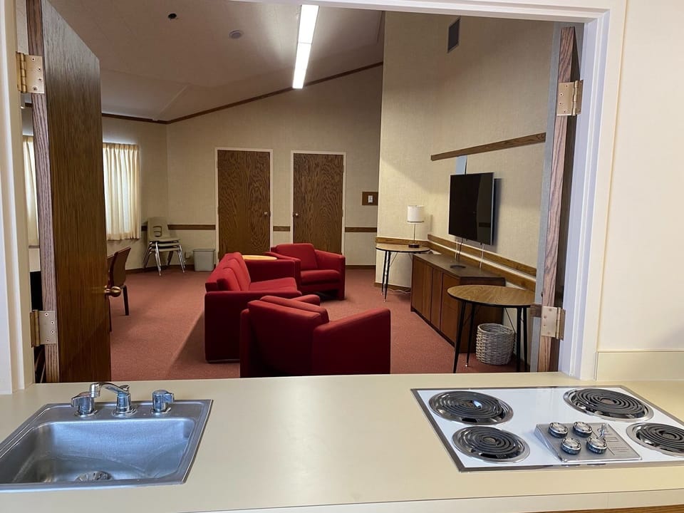 A view to the dining room, with pass-through window from kitchen.