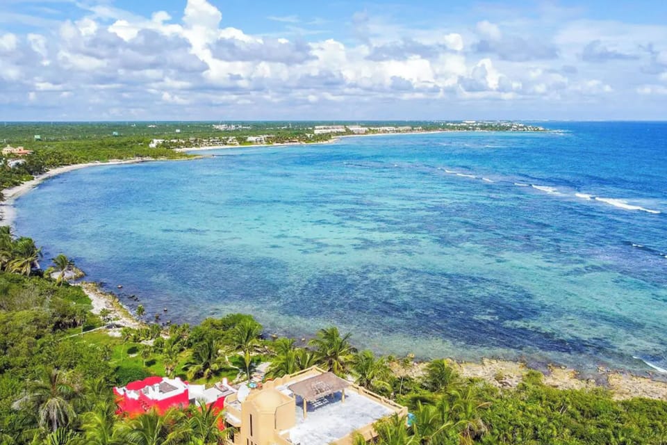 Luxury dive: Bird's-eye view of Akumal's ocean. Your front-row seat invites serene swimming.
