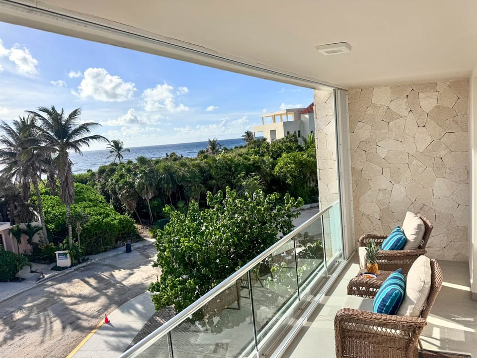 Enjoy your private balcony and feel the Akumal Sea breeze with stunning Caribbean views.