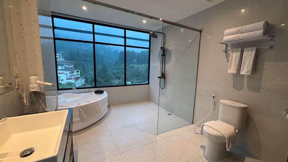 Presidential Studio Suite, 1 King Bed | Bathroom | Shower, rainfall showerhead, hair dryer, slippers
