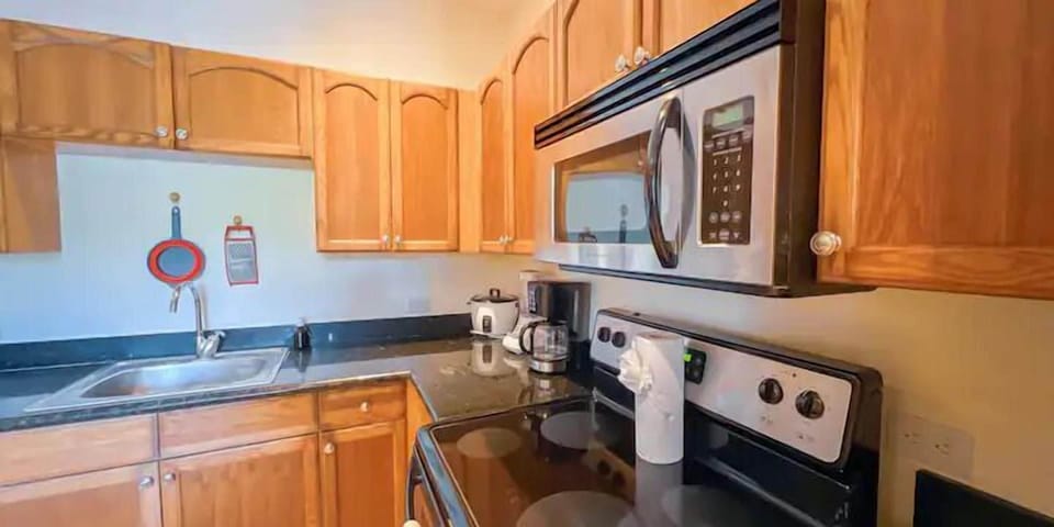 Basic Apartment, 2 Bedrooms | Private kitchen | Full-size fridge, microwave, stovetop, dishwasher