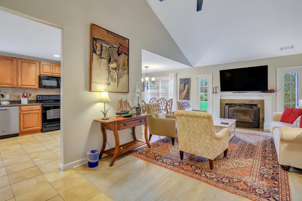 Living area with a tv.
