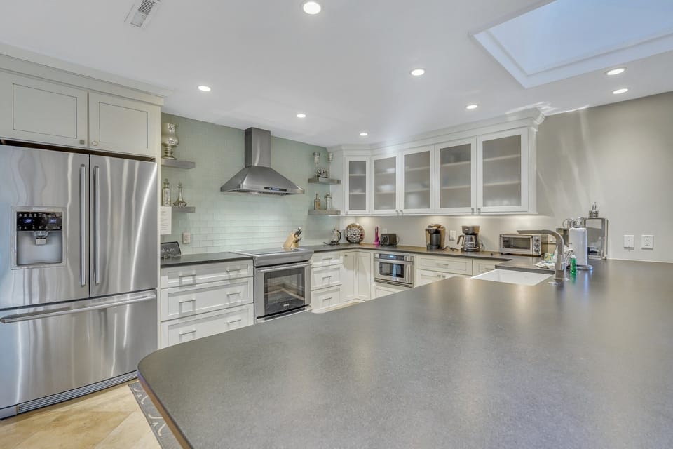Kitchen featuring stainless steel appliances and fully equipped