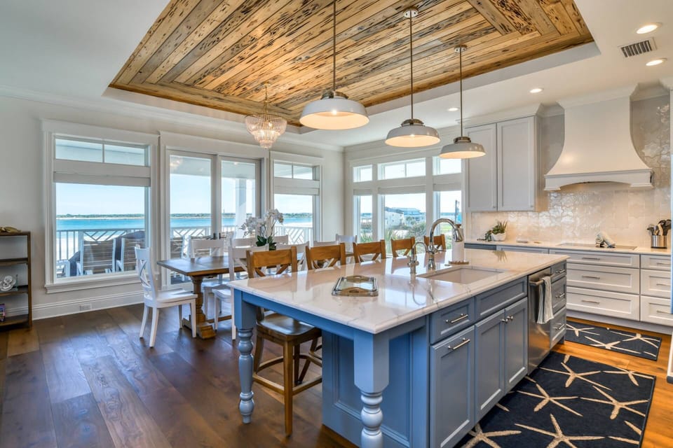 There is plenty of seating at the dining table and kitchen bar.