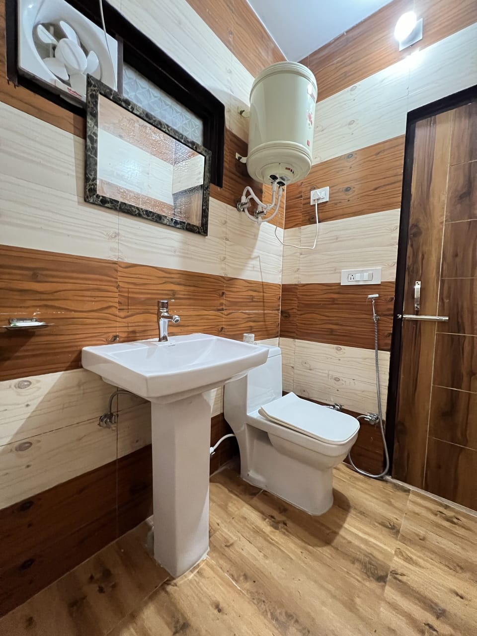 Shower, rainfall showerhead, slippers, towels