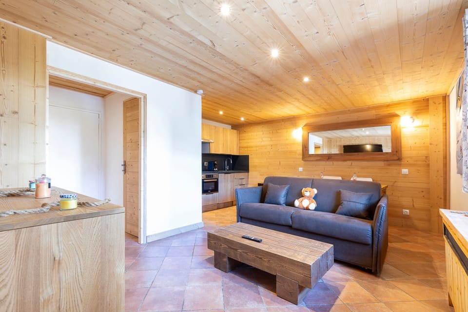 Apartment, Ensuite (au cœur de Megève ) | Living area | Flat-screen TV