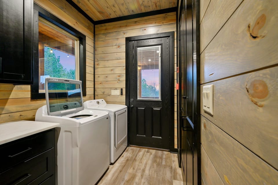 Full size washer and dryer in the laundry room located off the kitchen.