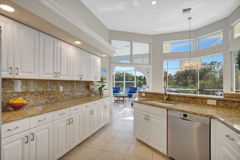 A long view down the kitchen towards the breakfast nook and family room